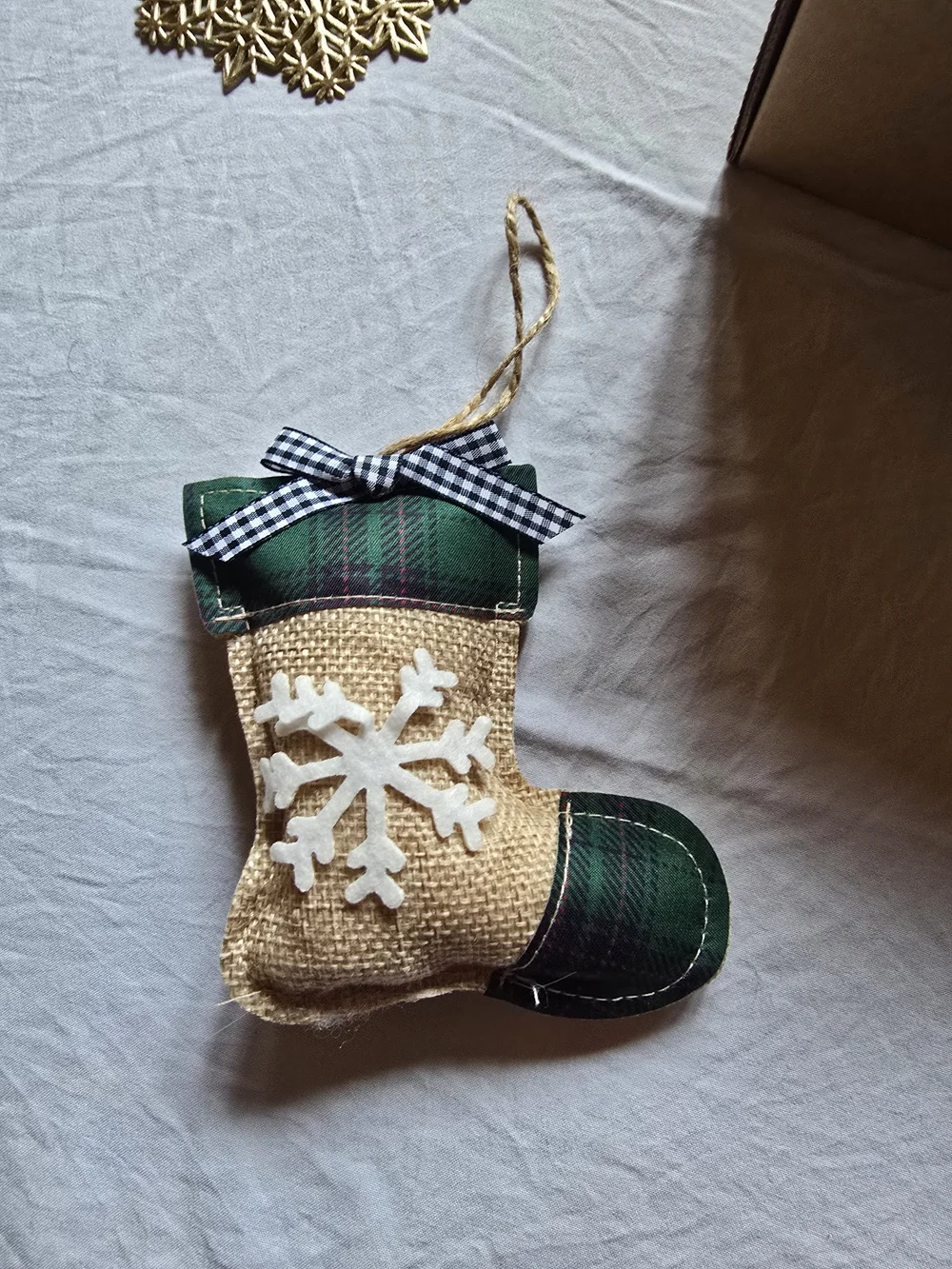 Holiday Home Gift Box with Cream Knit Throw and Green Ribbon Accents